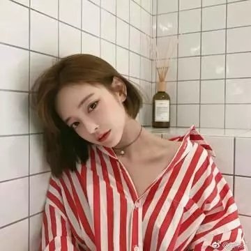 桃花含露又春风